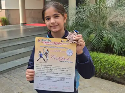 Manasvi Sharma with her National Taekwondo Championship award