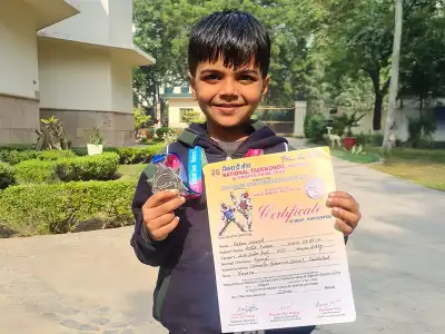 Aahan Nimesh with his National Taekwondo Championship award