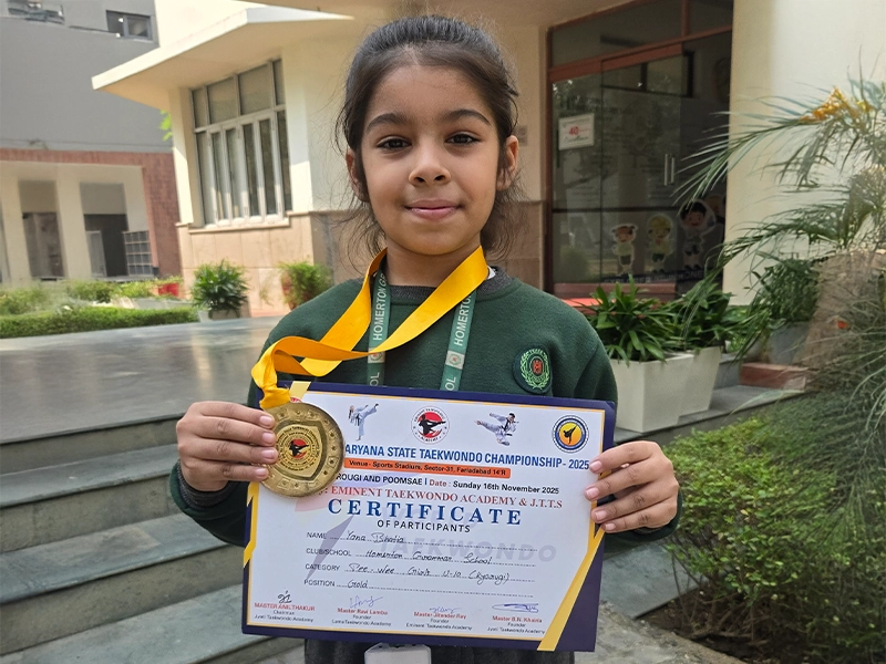 Yana Bhatia with her Haryana State Taekwondo Championship award